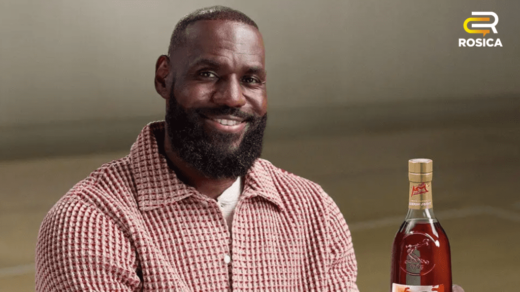 Lebron James holding a Hennessy bottle